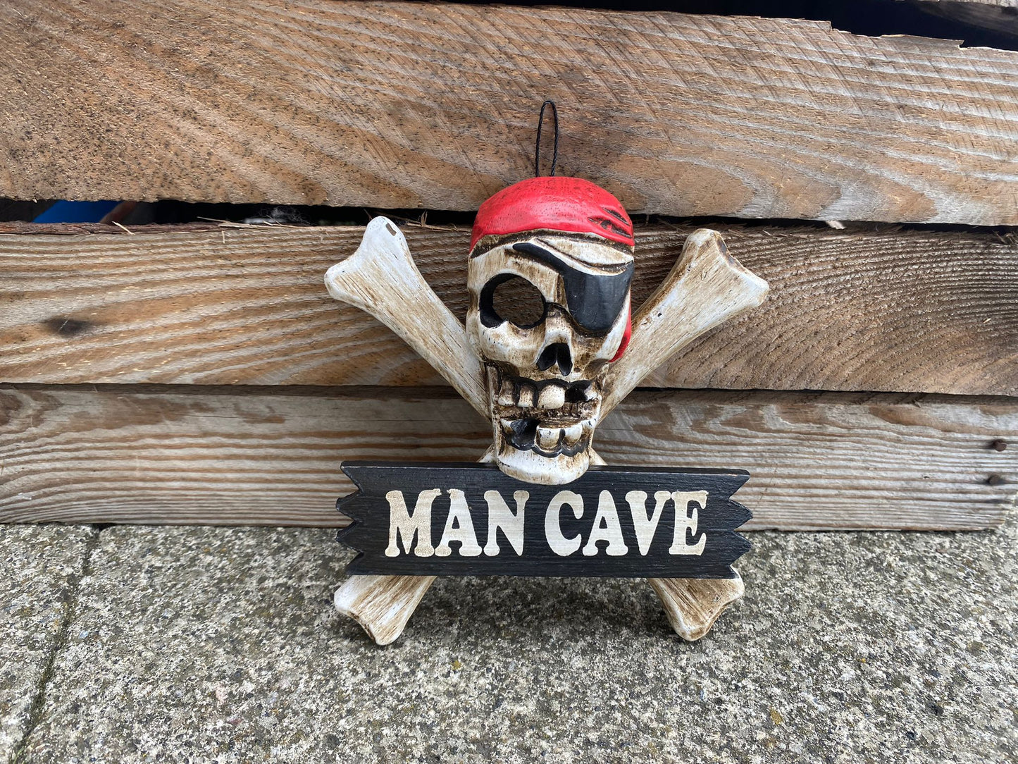 Small Skull and Cross Bones Sign